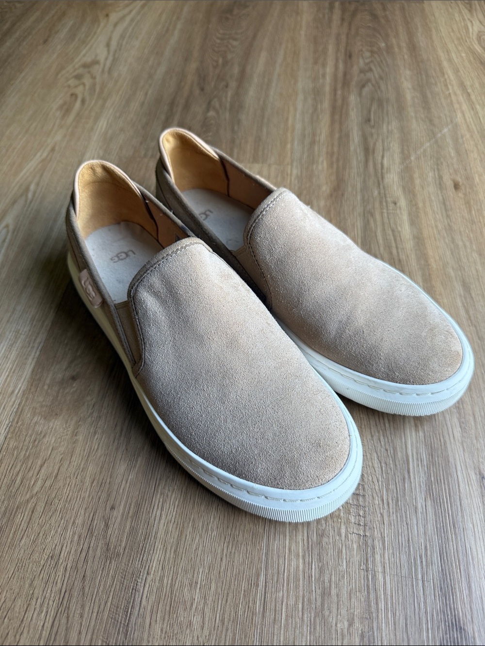 UGG women’s Slip-On Suede Loafers in Beige